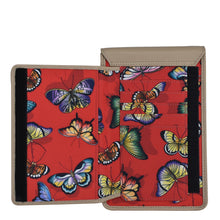 Load image into Gallery viewer, Colorful butterfly print Fabric with Leather Trim Cell Phone Crossbody Wallet - 13005 by Anuschka with multiple card slots and RFID protection open against a white background.

