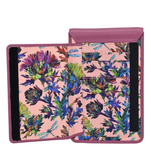 Open Anuschka pink wallet with a floral design, multiple card slots, and RFID protection.