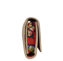 Load image into Gallery viewer, Anuschka Floral fabric glasses case with RFID protection on a white background.
