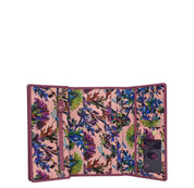 Open Anuschka Fabric with Leather Trim Three-Fold RFID Wallet - 13007 with multiple card slots, RFID protected, and a pink interior.