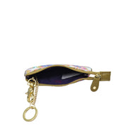 Small floral-patterned Anuschka pouch with zipper, partially open, showing a dark interior and attached keychain. Features a main compartment with top zip closure.