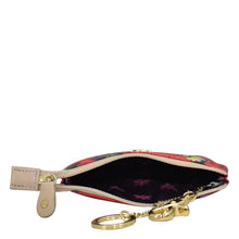 Load image into Gallery viewer, Small, patterned wristlet purse with zip entry, partially open, showing an empty main compartment - Anuschka Fabric with Leather Trim Zip Travel Pouch - 13008.
