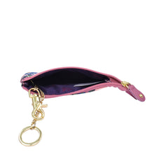 Load image into Gallery viewer, Open small pink Anuschka fabric with leather trim zip travel pouch with a golden keychain attachment and zip entry.

