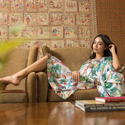 Anuschka womens silk robe in black with floral patterns made of recycled polyester.