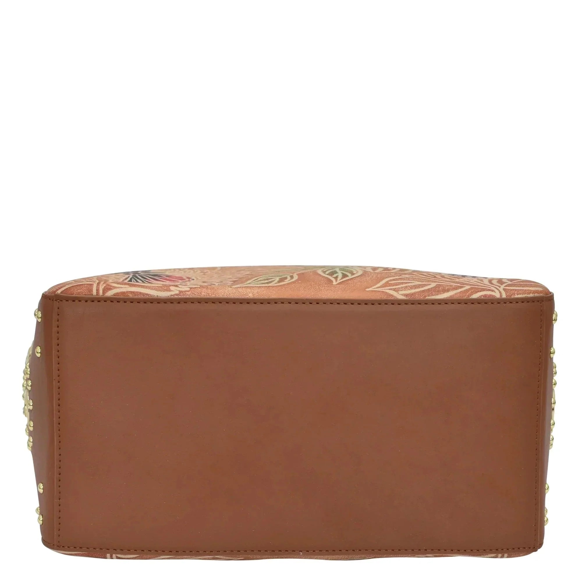 Brown genuine leather Anuschka Classic Hobo With Studded Side Pockets - 433 case with floral embroidery on the top edge.