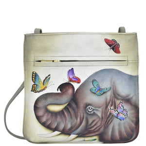 Anuschka style 452, handpainted Slim Crossbody With Front Zip. Gentle Giant painting in Multi color. Featuring Removable fabric optical case.