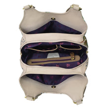 Load image into Gallery viewer, Open Anuschka Triple Compartment Satchel - 469 displaying interior compartments, a zippered pocket, and floral lining.

