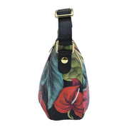 Floral print Everyday Shoulder Hobo - 670 handbag by Anuschka with a black leather strap against a white background.