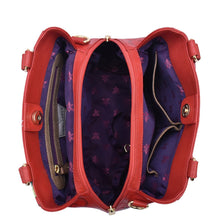 Load image into Gallery viewer, Open Anuschka Multi Compartment Satchel - 690 displaying interior compartments and purple lining with a floral pattern.
