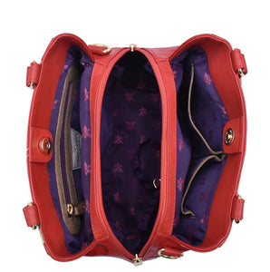 Open Anuschka Multi Compartment Satchel - 690 displaying interior compartments and purple lining with a floral pattern.