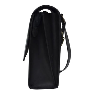 Side view of a black leather Flap Messenger Crossbody - 692 handbag by Anuschka with a shoulder strap and zipper closure.