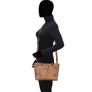 Side profile of a mannequin displaying a Anuschka Medium Tote - 693 handbag.