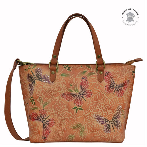 Anuschka style 693, Medium Tote. Tooled Butterfly in brown color. Top zip entry, Removable handle with full adjustability.