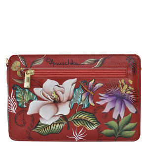 Red floral-patterned leather Triple Compartment Crossbody - 696 with a zipper closure, organized compartments, and Anuschka brand name in script.