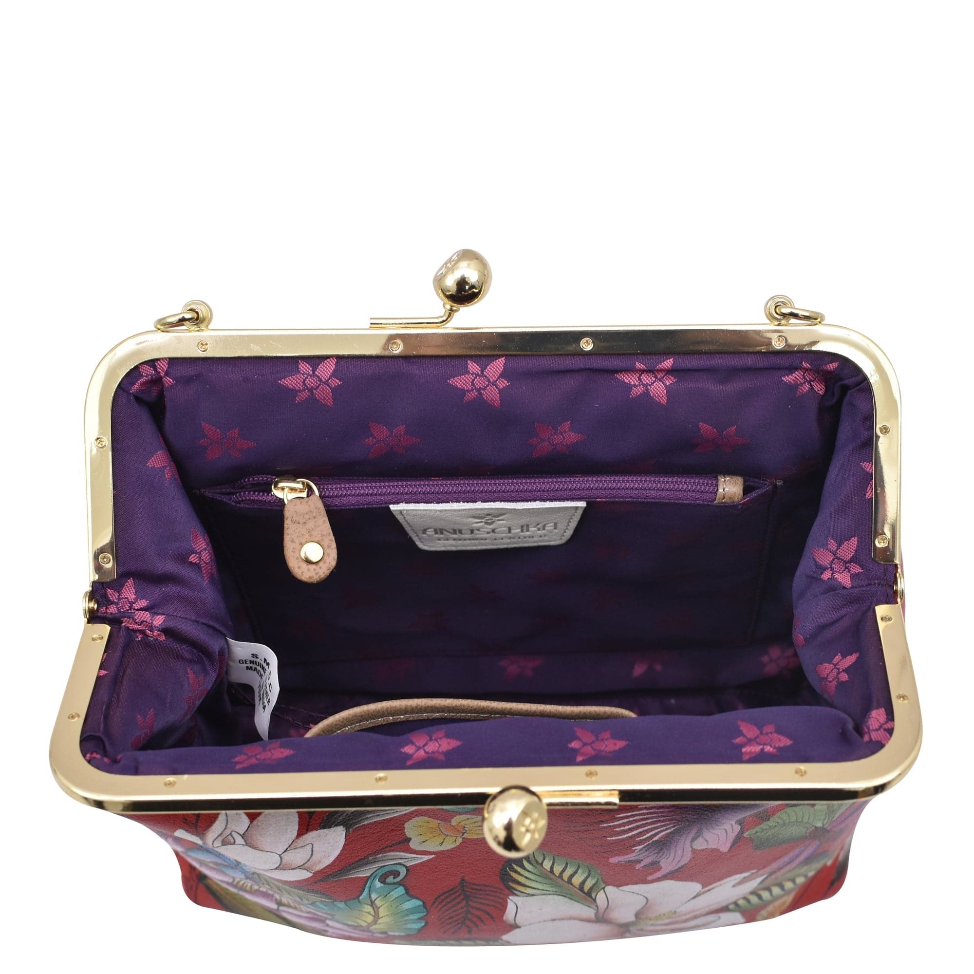 Open Anuschka Medium Frame Crossbody - 700 with a purple interior and a metal clasp closure, featuring a vintage-inspired structured style.
