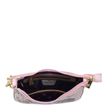 Load image into Gallery viewer, Pink floral patterned Anuschka Small Convertible Hobo - 701 waist bag open to show the interior compartment.
