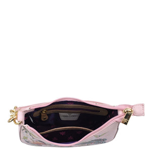 Pink floral patterned Anuschka Small Convertible Hobo - 701 waist bag open to show the interior compartment.