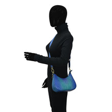 Load image into Gallery viewer, Mannequin displaying a blue Small Convertible Hobo - 701 by Anuschka with gold detailing.
