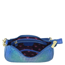 Load image into Gallery viewer, Blue textured Anuschka genuine leather wristlet with open zipper, revealing a floral-lined interior.
