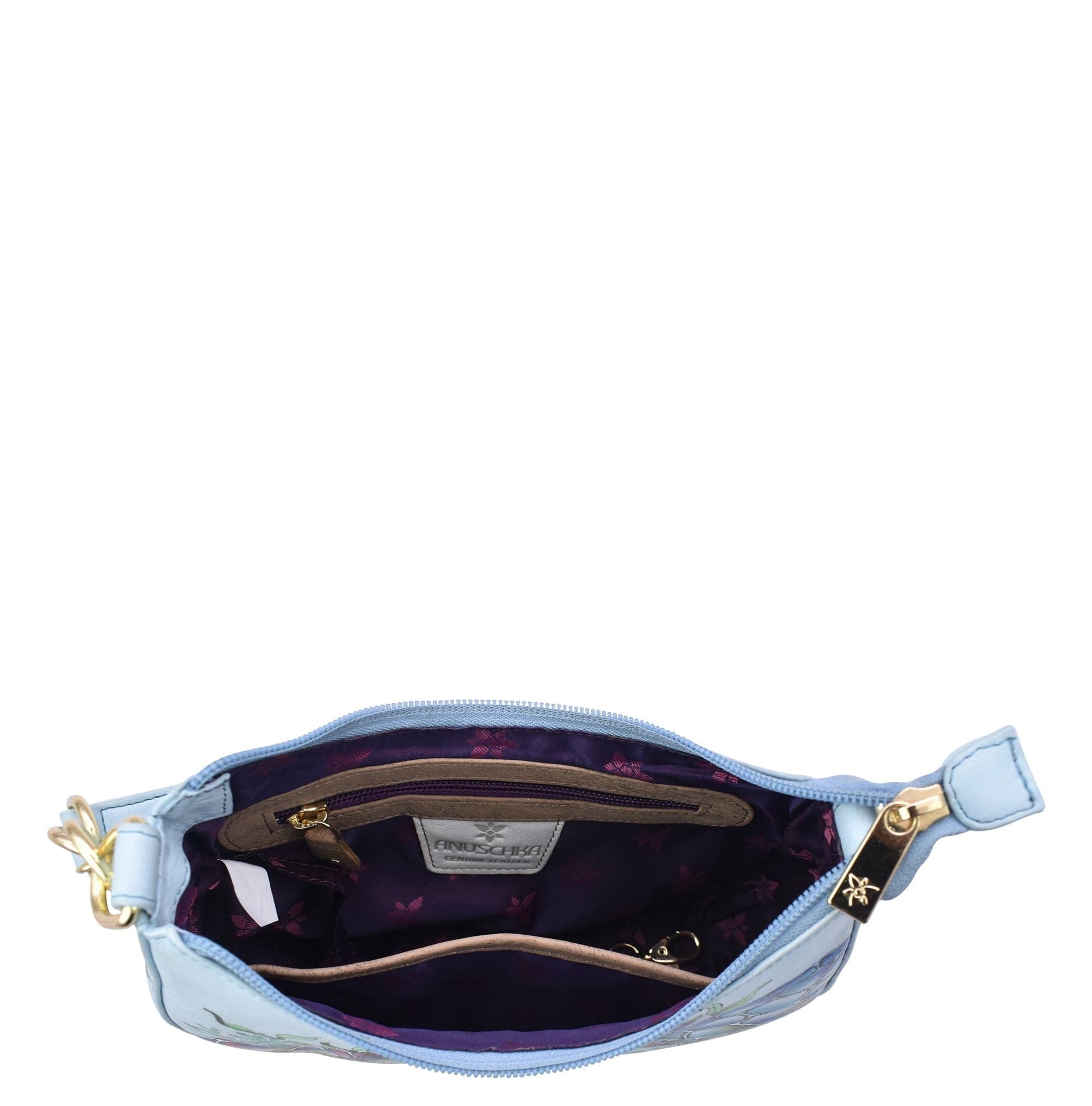 Light blue leather Small Convertible Hobo - 701 shoulder bag open to reveal a floral interior, showing a zipper pocket and Anuschka label, isolated on a white background.