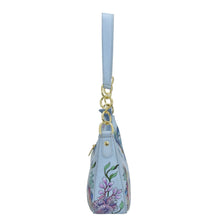 Load image into Gallery viewer, Light blue floral-patterned Small Convertible Hobo - 701 shoulder bag with a crossbody strap and gold tone hardware by Anuschka, isolated on a white background.
