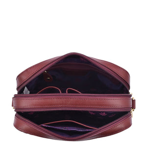 Open Anuschka Twin Top Messenger - 704 with a visible interior pocket and gold zipper.