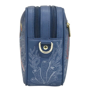 Side view of a blue Anuschka Twin Top Messenger - 704 with a coral and fish pattern, a single zipper closure, and RFID protected.